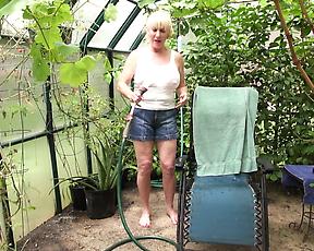 Naked mature feels pussy and ass in greenhouse solo scenes